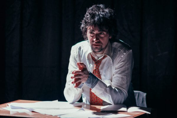 Andrew opens the show "By the Hour" with a fake monologue.

Photo by John Matthews